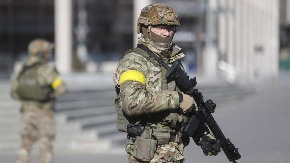 Ukrainian soldiers stand at Maidan Nezalezhnost (Independence Square) in Kiev (Kyiv), Ukraine