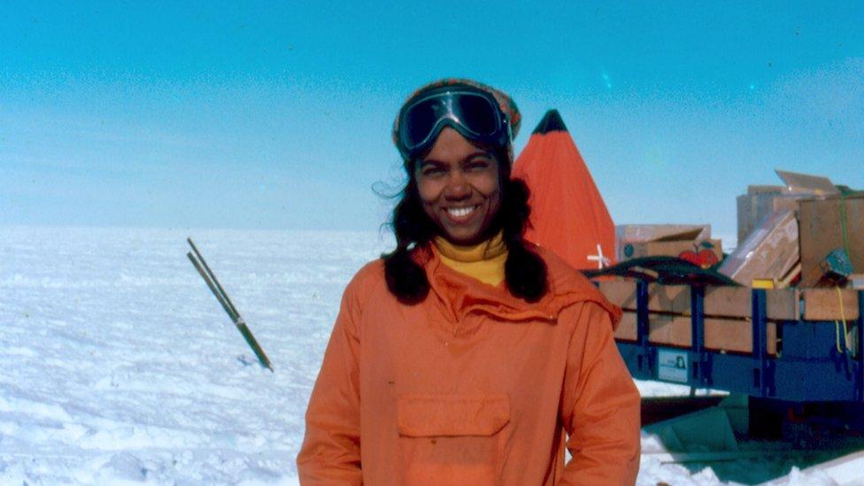 Sudipta stands in ice landscape