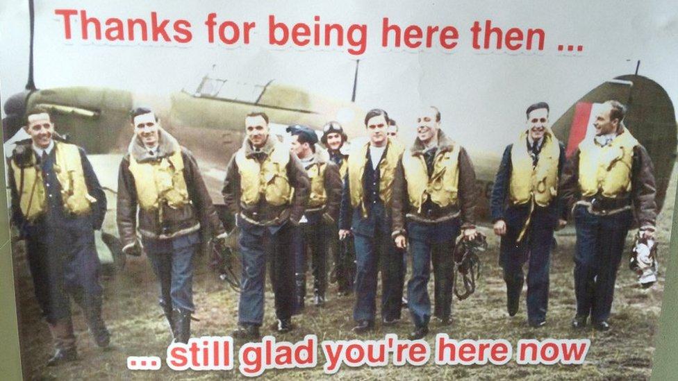 A poster showing airmen saying "Thanks for being here then... still glad you're here now #PolesinUK."