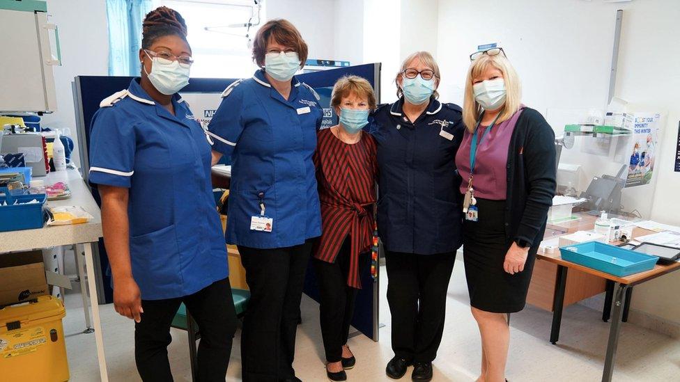 Margaret Keenan with staff from University Hospital Coventry