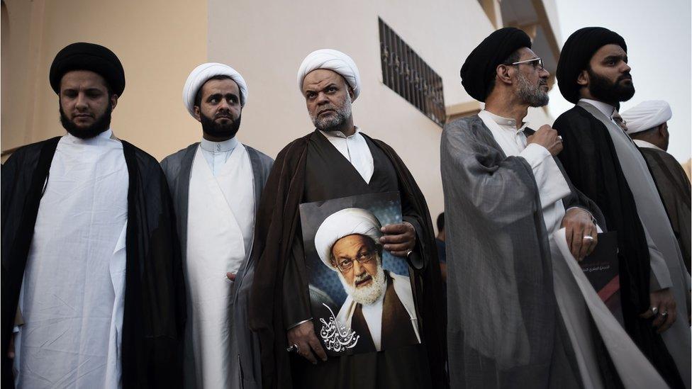 Bahraini Shiite clerics attend a protest against the revocation of the citizenship of top Bahraini Shiite cleric