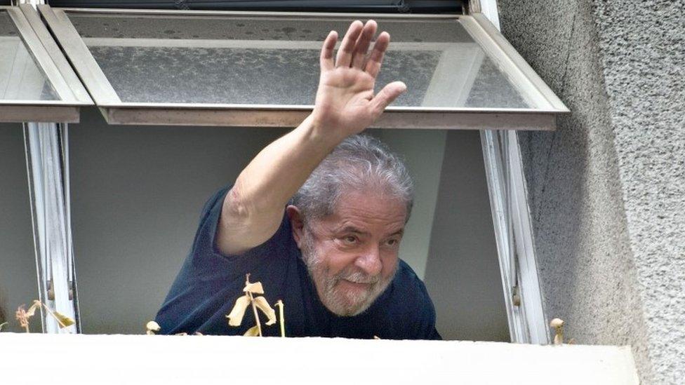 Former Brazilian President Luiz Inacio Lula da Silva waves at supporters in Sao Paulo, Brazil, on 4 March 2016.