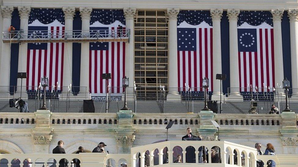 US Army Sergeant Major Greg Lowery (centre) plays the role of President-elect Donald Trump in a rehearsal for the presidential inauguration at the US Capitol in Washington (15 January 2017)