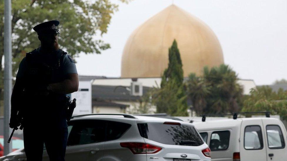 policeman stands outside a Christchurch mosque