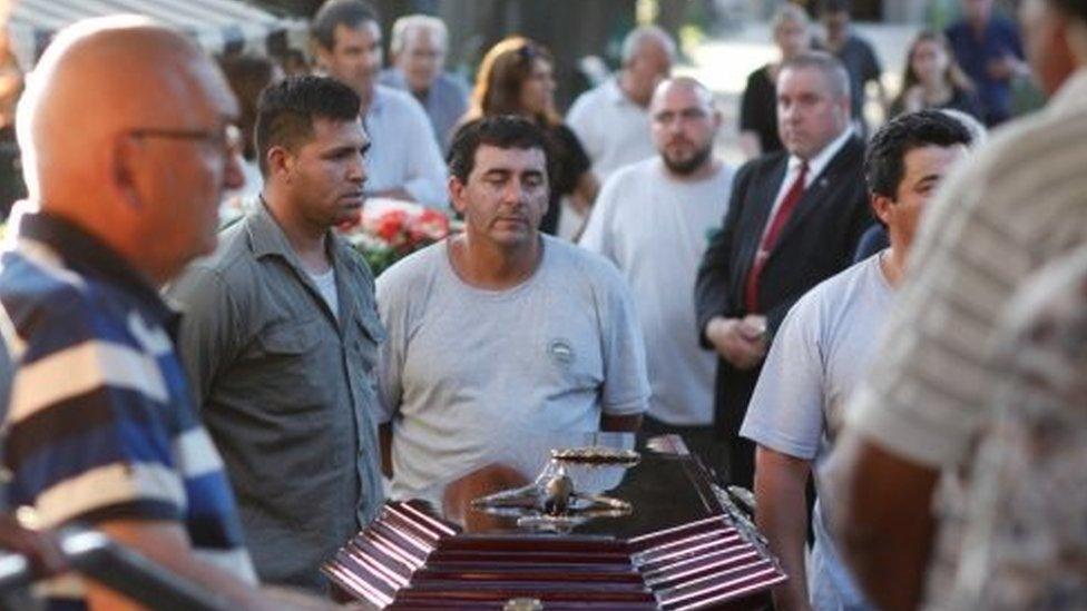 The coffin of Diego Angelini, one of the five Argentine citizens who were killed in the truck attack in New York on October 31, arrives at the Dissidents Cemetery in Rosario, Argentina November 6, 2017.