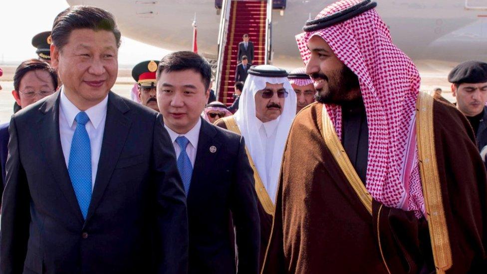 Chinese President Xi Jinping is greeted at Riyadh's airport on Tuesday by Saudi Arabia's Deputy Crown Prince and Defence Minister, Mohammed bin Salman