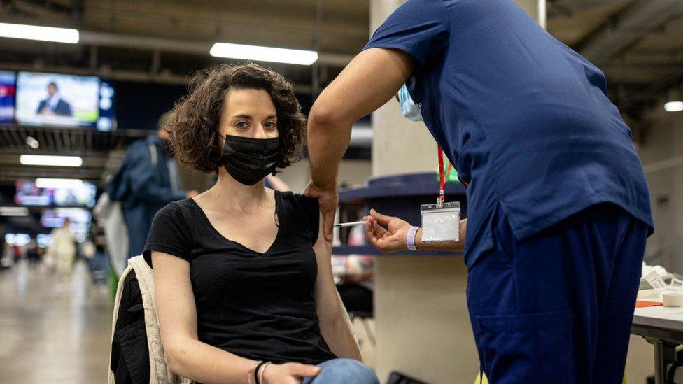 Woman receiving Covid vaccination