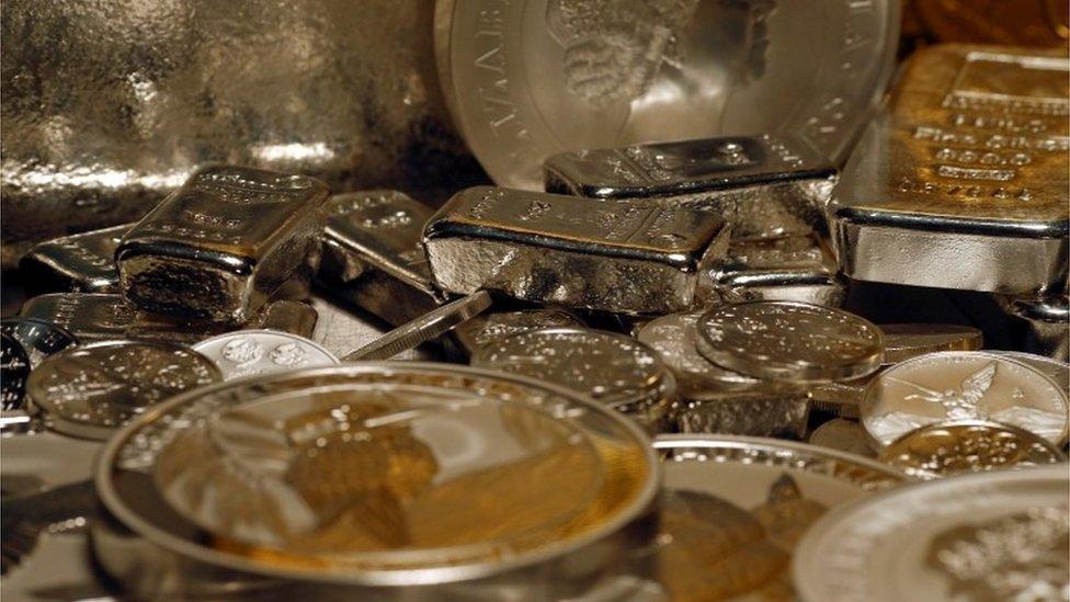 Silver bars and coins