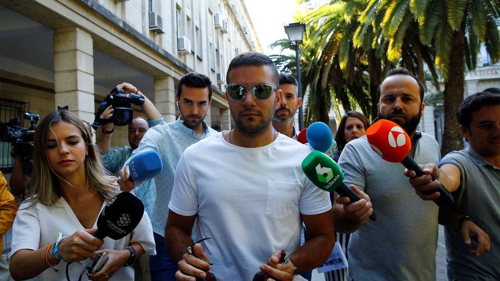 Angel Boza, a member of the group known as La Manada ("The Wolf Pack"), exits a courthouse in Seville, Spain, June 21, 2019