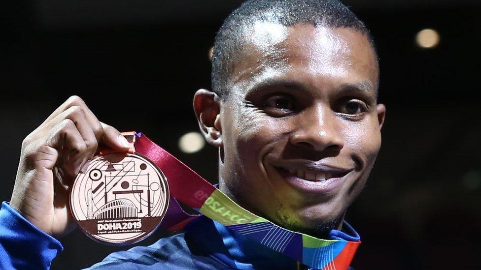 Bronze medallist Ecuador's Alex Quinonez poses on the podium during the medal ceremony for the Men's 200m in 2019