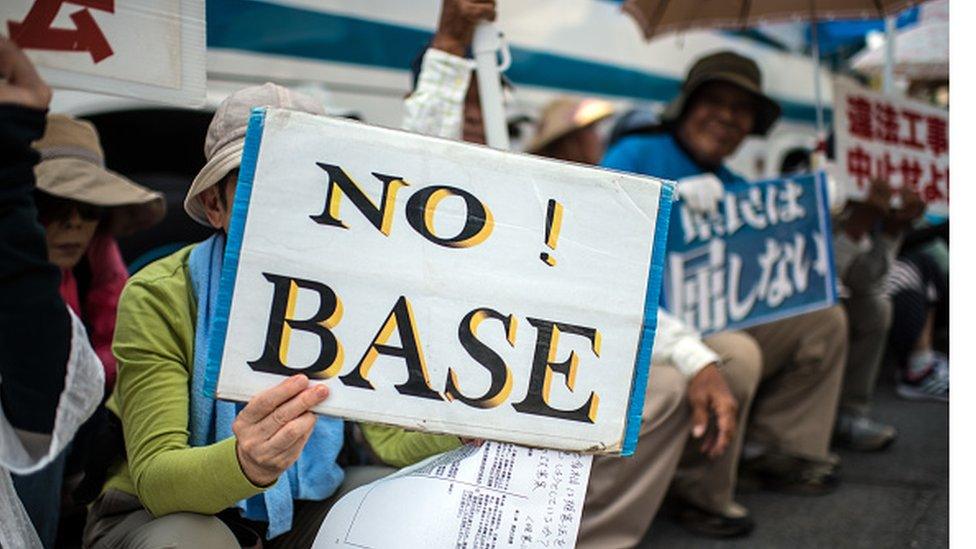 Protests demanding the withdrawal of US bases are a common sight in Okinawa