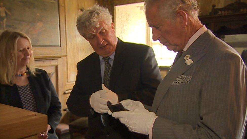 Prince Charles examines Nanteos Cup