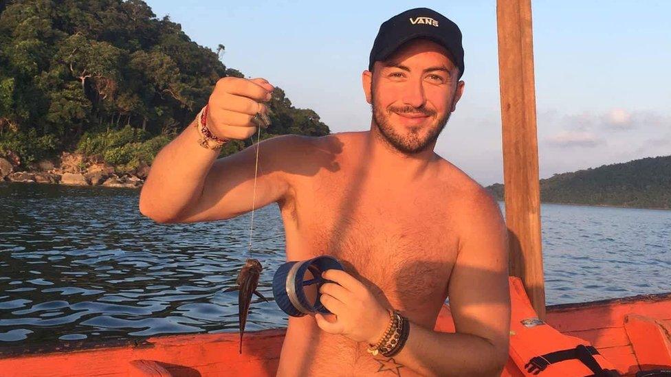 Calvin Hill pictured fishing in Cambodia