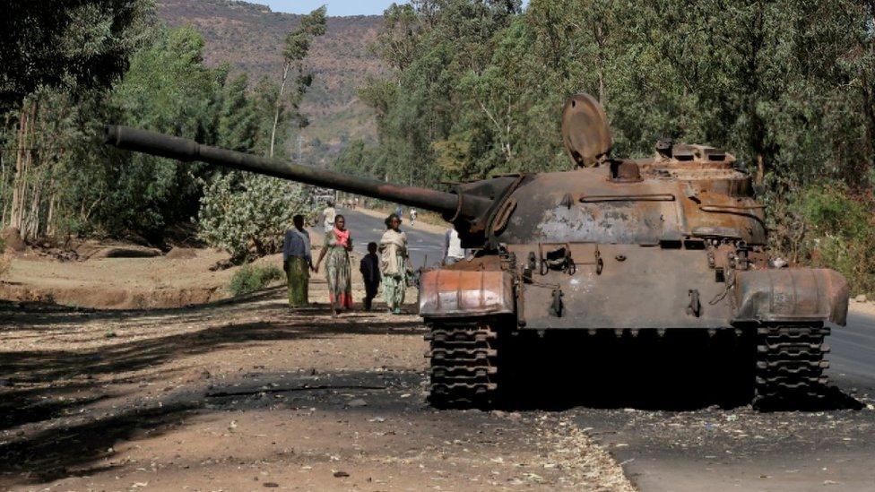 A burned tank stands near the town of Adwa, Tigray region, Ethiopia, March 18, 2021.