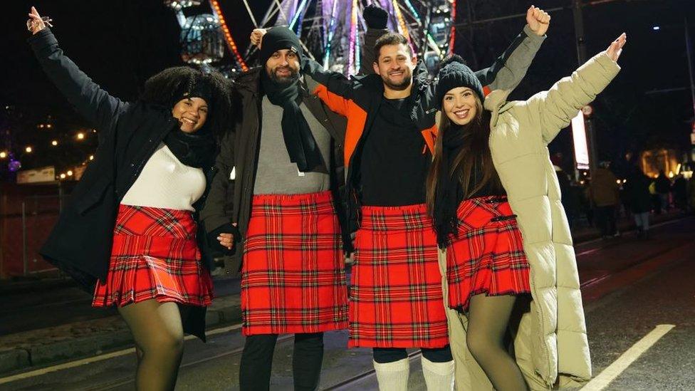 Revellers celebrate the start of 2024 in Edinburgh