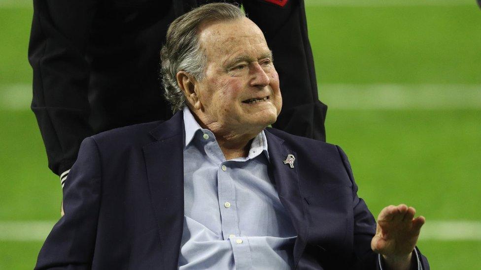 President George H.W. Bush arrives for the coin toss prior to Super Bowl 51 between the Atlanta Falcons and the New England Patriots at NRG Stadium on February 5, 2017 in Houston, Texas