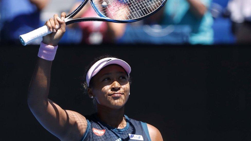 Japan's Naomi Osaka acknowledges the crowd after winning her match against Ukraine"s Elina Svitolina.