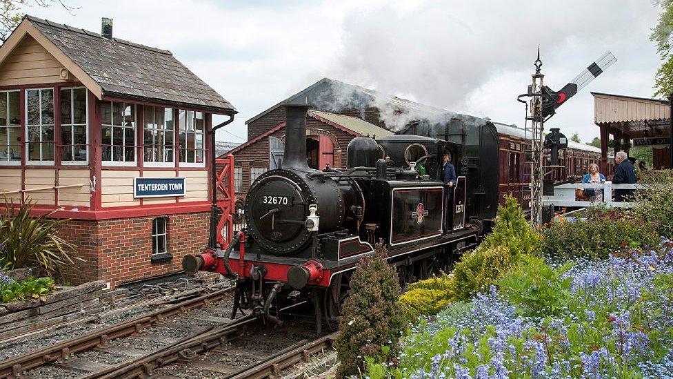 A steam train at Tenterden Town station