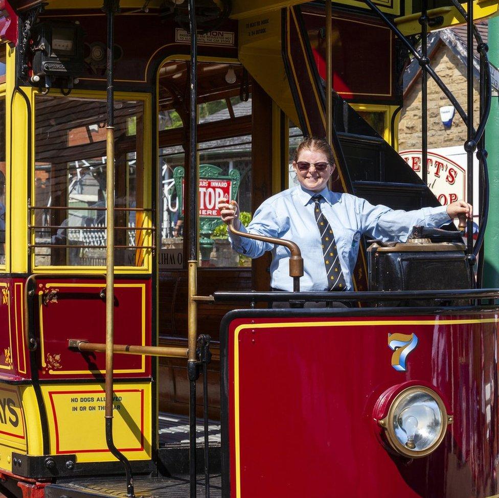 Sarah driving a tram