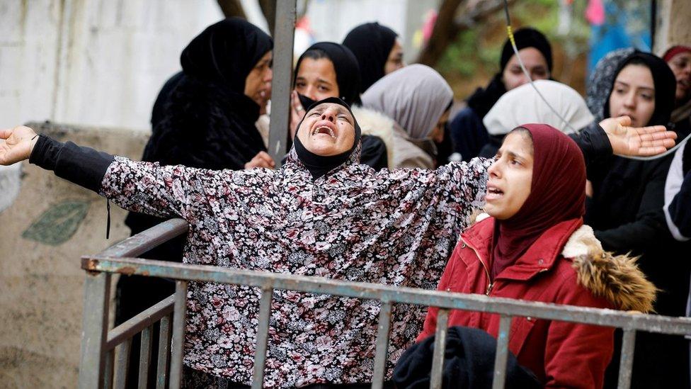 Relatives of Nader Rayan, 16, mourn after he was shot dead during clashes with Israeli forces at the Balata refugee camp near Nablus, in the occupied West Bank (15 March 2022)