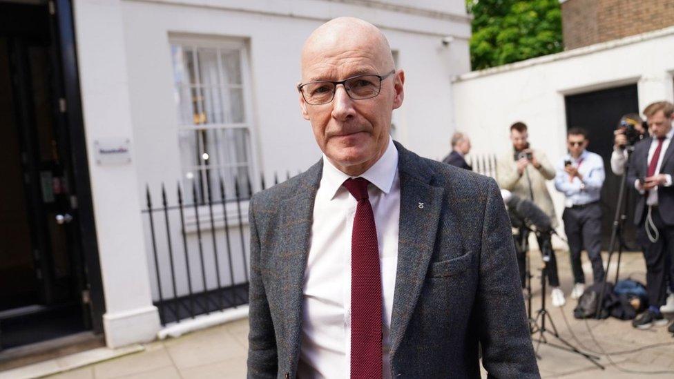 John Swinney speaks to the media outside the Resolution Foundation in Queen Anne's Gate, London, on Monday