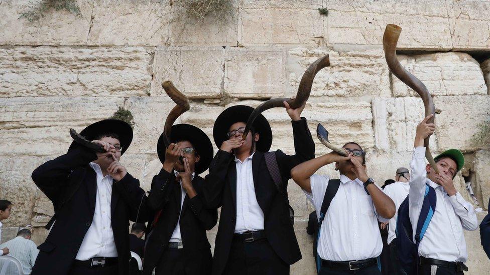 Children blowing the Shofar