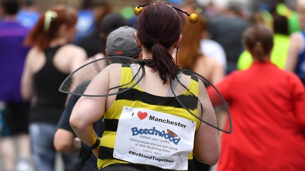 A runner dressed as a bee in the Great Manchester Run