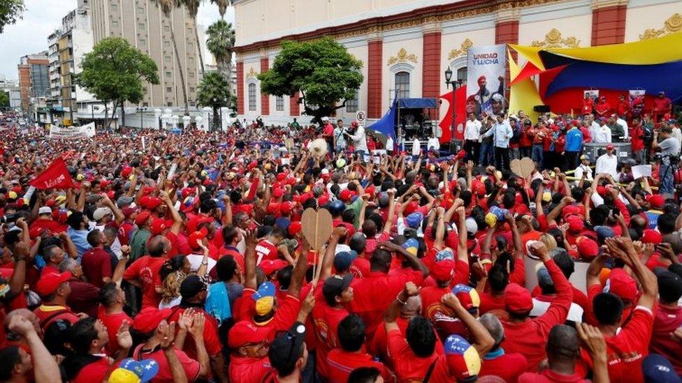 Venezuela's President Nicolas Maduro (R) speaks during a rally with pro-government members of the public transport sector in Caracas, Venezuela May 31, 2016