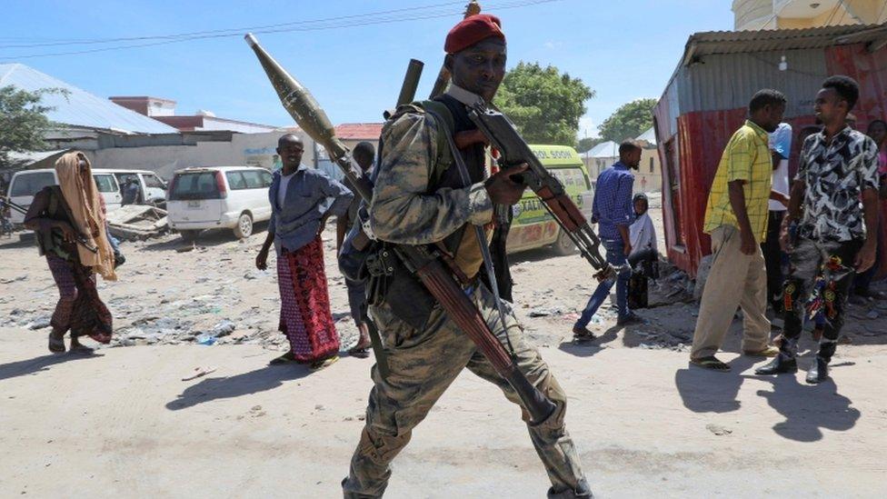 Somali military officer supporting opposition leaders walks along streets of Yaqshid district of Mogadishu, Somalia April 25, 2021