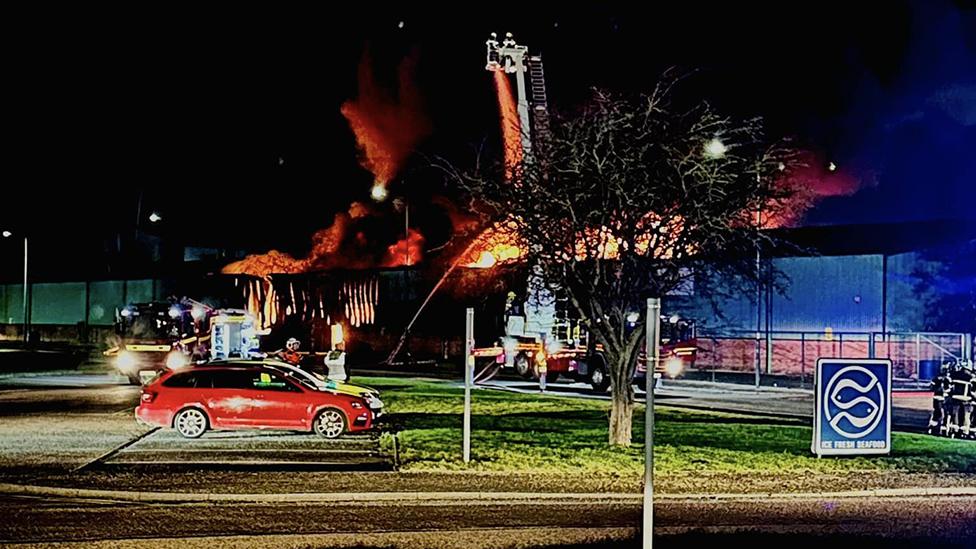 Firefighters tackling the blaze