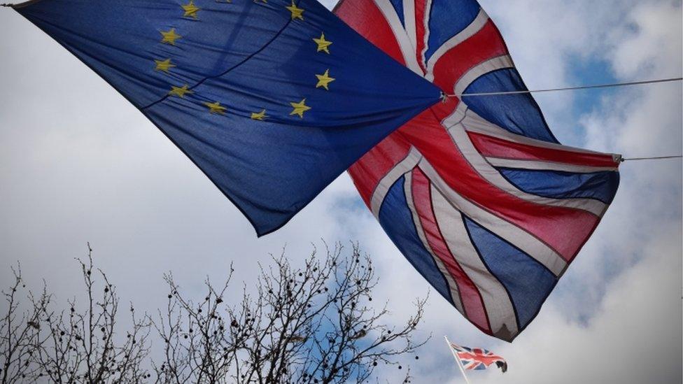 UK and EU flags flying