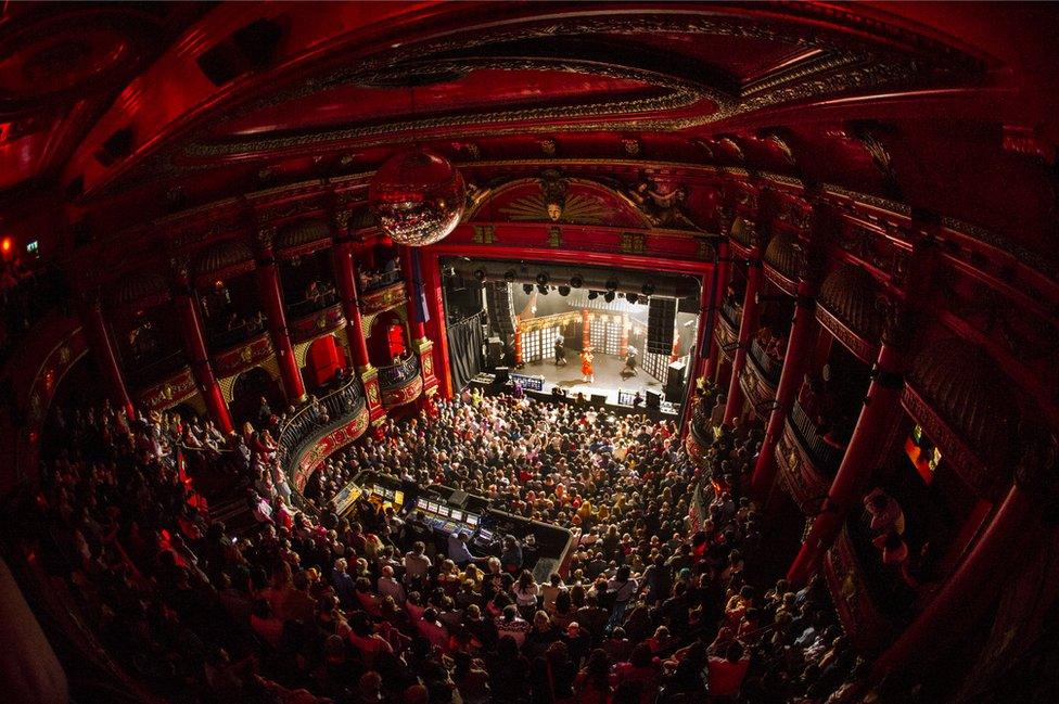 Wide angle shot of crowd inside