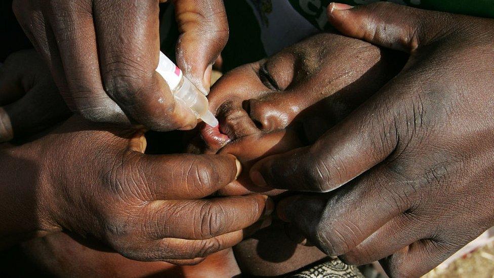 Child receiving vaccine