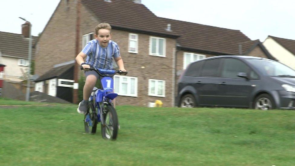 Harrison on his bike