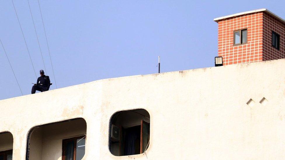 A security officer keeps watch at the Pakistani Foreign Ministry building in Islamabad, Pakistan, 18 January 2024