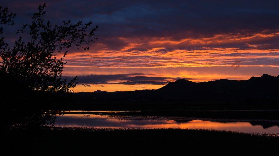 Graham Bond captured this picture on his way to Porthmadog, Gwynedd. It shows the sunset over the Tremadog area.