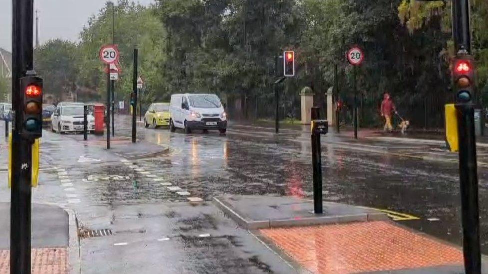 Traffic lights showing red with cycle lane lights also on red