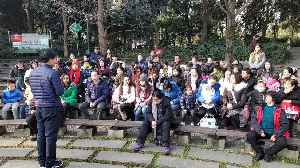 Members of Early Rain Covenant Church worship outside on 16 December