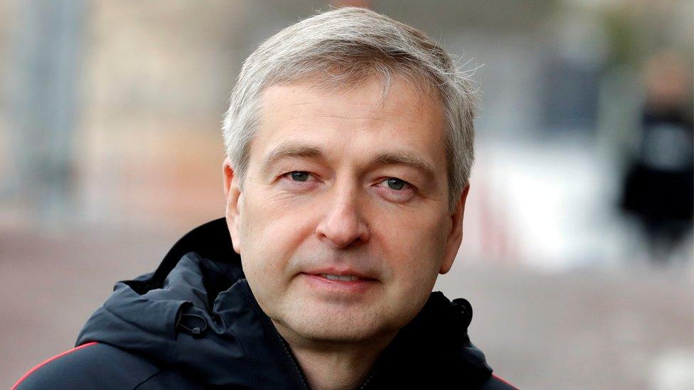 Dmitry Rybolovlev is pictured alone, dressed in sporting apparel during a Monaco football training session