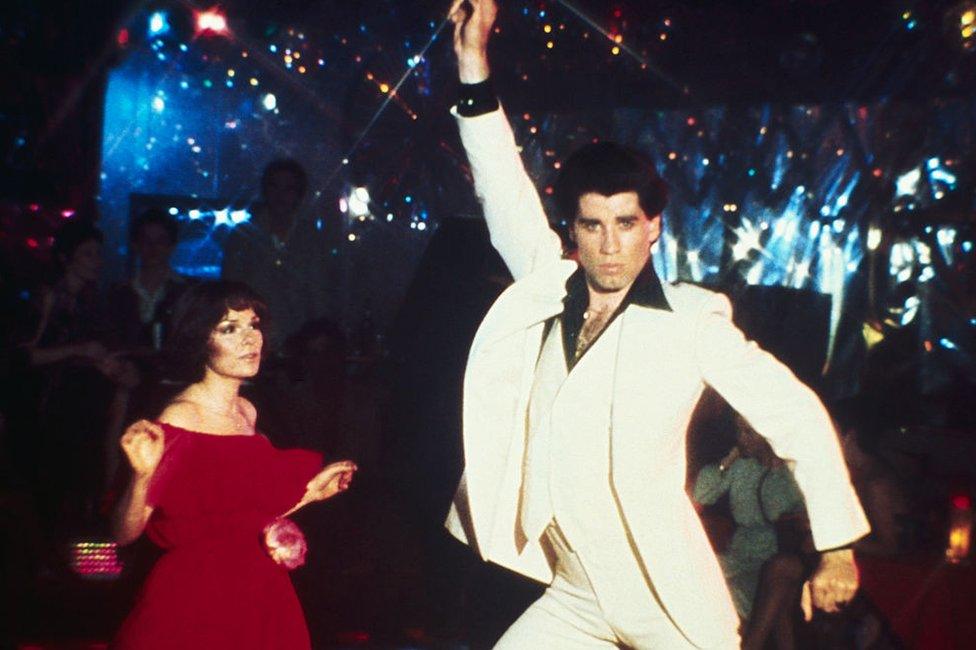 Actor John Travolta dancing with actress Karen Gorney in the movie "Saturday Night Fever".