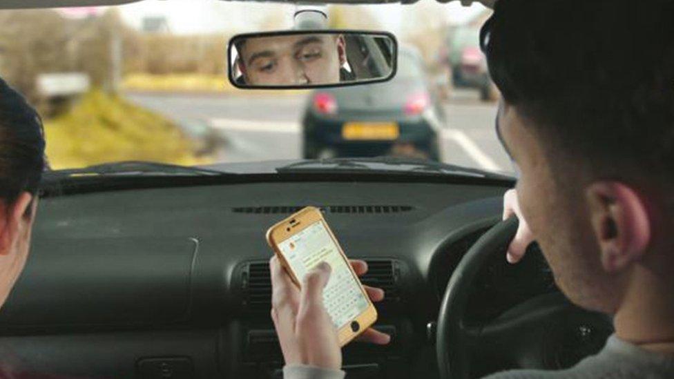 Driver using a mobile phone