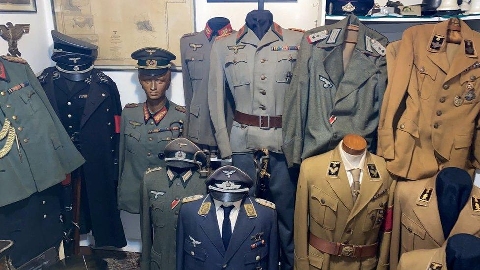 Nazi clothes are seen in a home of an alleged paedophile in Rio de Janeiro