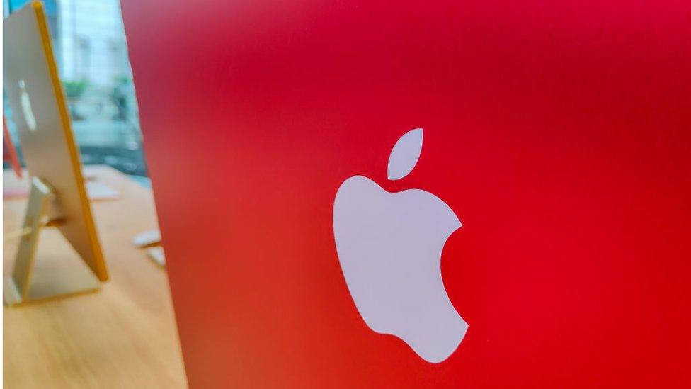 An Apple iMac in bright red at apple's Shanghai store