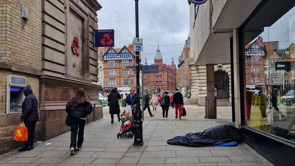 Person sleeping on the street in Nottingham