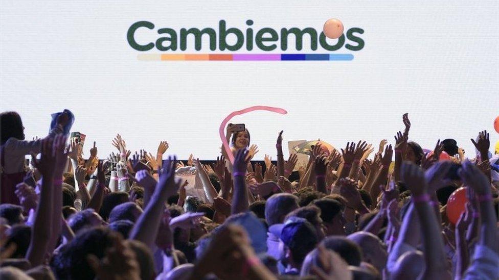 Supporters of Mauricio Macri celebrate at the party's headquarters in Buenos Aires, on 22 November, 2015