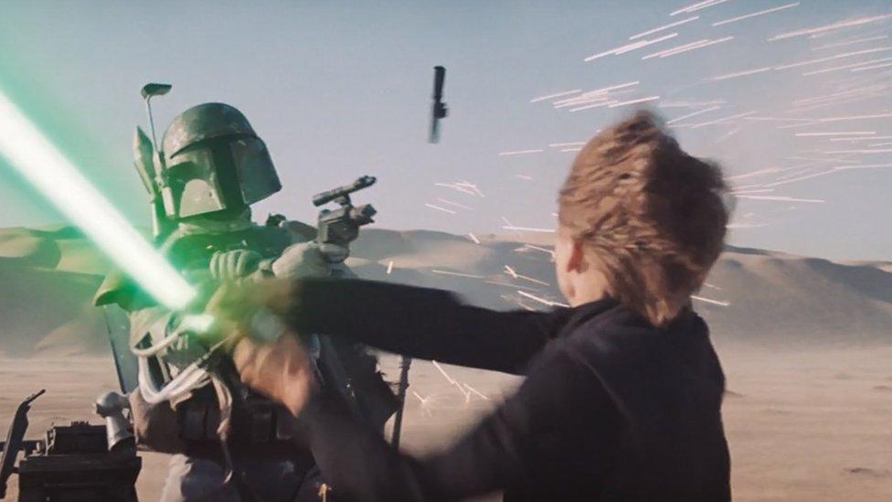 Boba Fett battling Luke Skywalker in Return of the Jedi.