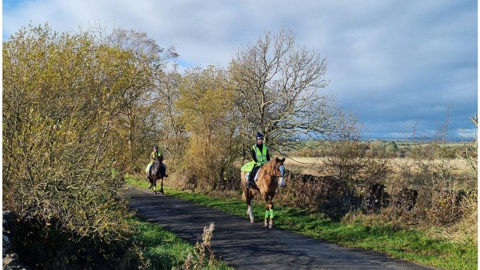 Volunteers on horseback