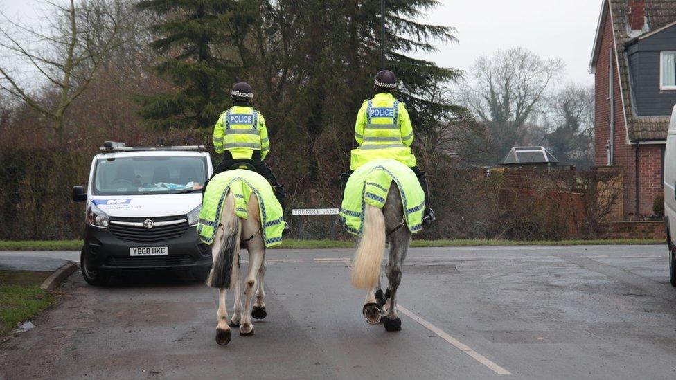 Police officers on horseback