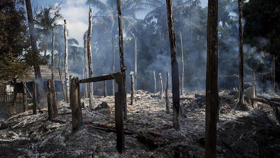 Smouldering debris of burned houses is seen in Warpait village, a Muslim village in Maungdaw located in Rakhine State on October 14, 2016