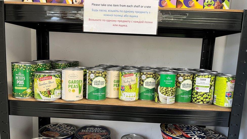 shelves of tinned peas